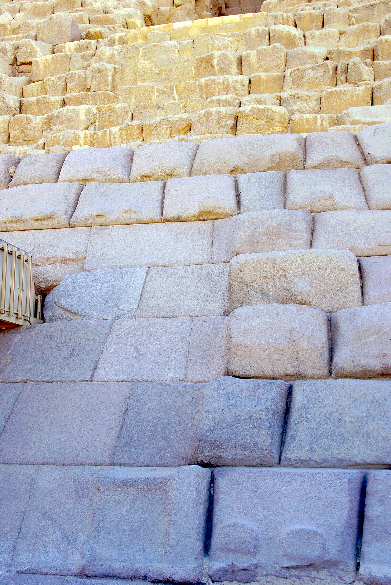 Published close photograph of unfinished granite casing blocks at Menkaure