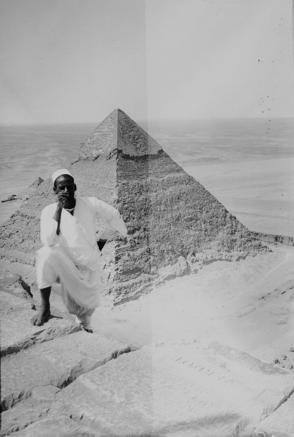Historic view from Khufu's broad summit toward the Pyramid of Khafre